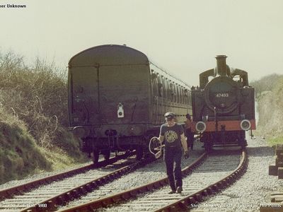 A very early view from April 1980 of Merryfield Lane Halt with the late Steve Marks having just got the token to adjust the points from the driver of Jinty 47493